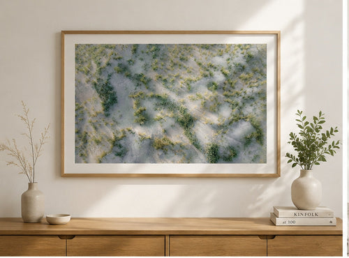 Coastal Texture landscape art in natural oak frame above console